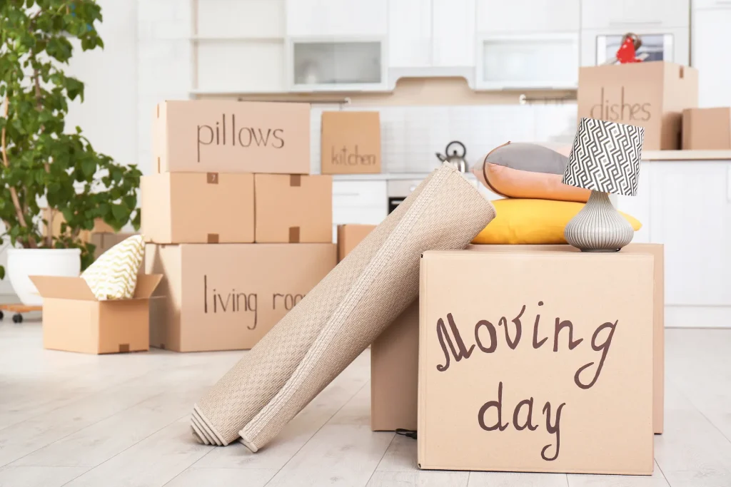 Boxes and moving supplies representing apartment, self storage, and portable storage solutions during a move.